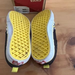 2 youth black, yellow, white checkered vans sneakers.